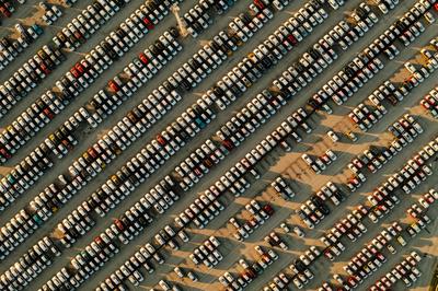 Aerial view new cars lined up in the parking station-stock-photo