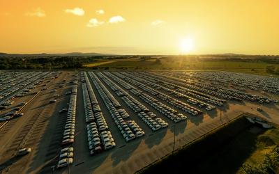 Aerial view new cars lined up in the parking station-stock-photo