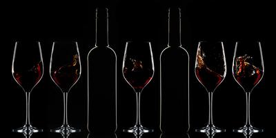 Red wine bottle and filled glass-stock-photo