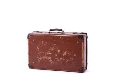 vintage brown suitcases on white background-stock-photo