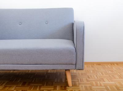 Grey couch on the white background-stock-foto