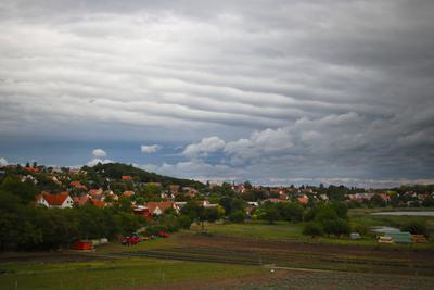 Landscape with houses and clouds in summer.-stock-photo