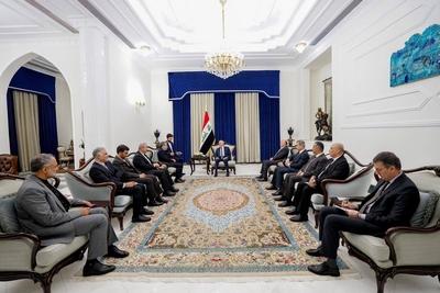 Iraqi President Abdul Latif Jamal Rashid, receives the Minister of Foreign Affairs of the Islamic Republic of Iran, Abbas Araqchi-stock-photo