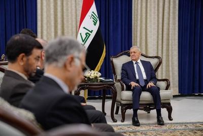 Iraqi President Abdul Latif Jamal Rashid, receives the Minister of Foreign Affairs of the Islamic Republic of Iran, Abbas Araqchi-stock-photo