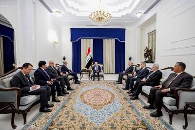 Iraqi President Abdul Latif Jamal Rashid receives Syrian Minister of Foreign Affairs and Expatriates Bassam Sabbagh-stock-photo