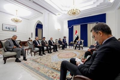 Iraqi President Abdul Latif Jamal Rashid, receives the Minister of Foreign Affairs of the Islamic Republic of Iran, Abbas Araqchi-stock-photo