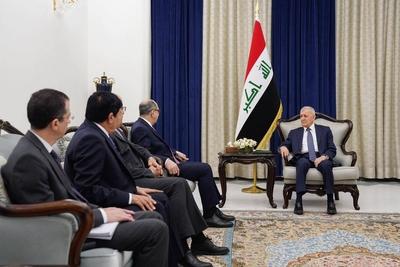 Iraqi President Abdul Latif Jamal Rashid receives Syrian Minister of Foreign Affairs and Expatriates Bassam Sabbagh-stock-photo