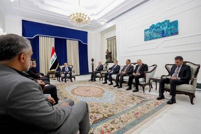 Iraqi President Abdul Latif Jamal Rashid, receives the Minister of Foreign Affairs of the Islamic Republic of Iran, Abbas Araqchi-stock-photo
