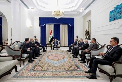 Iraqi President Abdul Latif Jamal Rashid receives Syrian Minister of Foreign Affairs and Expatriates Bassam Sabbagh-stock-photo