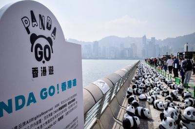 HONG KONG, CHINA - DECEMBER 07: Thousands of giant panda sculptures are displayed at the Avenue of Stars in Tsim Sha Tsu-stock-photo
