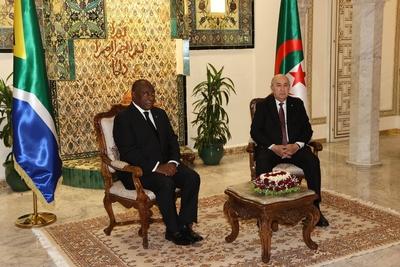 Algerian President Abdelmadjid Tebboune honors South African President Cyril Ramaphosa, and awards him the Athir Medal,-stock-photo