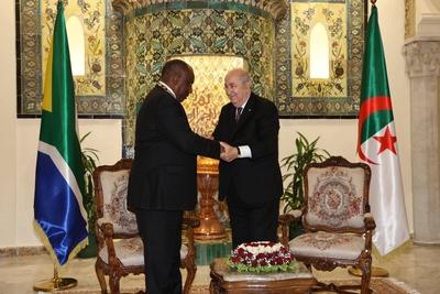 Algerian President Abdelmadjid Tebboune honors South African President Cyril Ramaphosa, and awards him the Athir Medal,-stock-photo