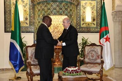 Algerian President Abdelmadjid Tebboune honors South African President Cyril Ramaphosa, and awards him the Athir Medal,-stock-photo