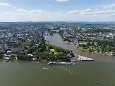 Aerial drone view of the deutsche Eck, monument in the city of Koblenz, Germany at sunset. Aerial drone view of the deut-stock-photo