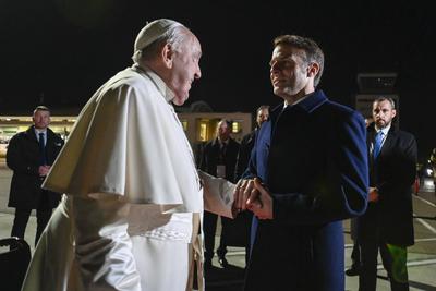 FRANCE - FRENCH PRESIDENT EMMANUEL MACRON MEETS  POPE FRANCIS   AT THE AJACCIO AIRPORT AFTER THE FIRST PAPAL VISIT EVER TO THE  FRENCH ISLAND OF CORSICA  - 2024/12/15-stock-photo