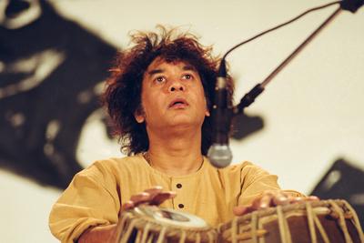 Indian classical music maestro Ustad Zakir Hussain playing tabla in concert NO MR Copyright: xMukeshxParpiani/DinodiaxPh-stock-photo