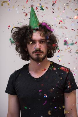 confetti man on party young man on party celebrating new year with falling confetti ,model released, Symbolfoto Copyrigh-stock-foto