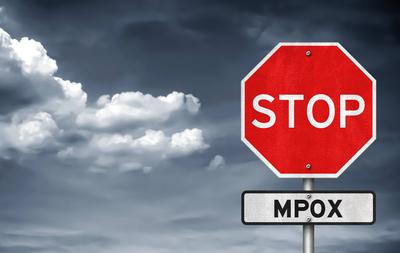 Stop Mpox sign - formerly known as monkeypox Stop Mpox sign - formerly known as monkeypox Copyright: xZoonar.com/Grzegor-stock-foto
