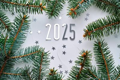 Abstract light Christmas background with stars and a Christmas tree with the year number 2025. Abstract light Christmas-stock-photo