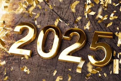 Bavaria, Germany - December 10, 2024: The year 2025 in gold surrounded by sparks and fireworks. Symbolic image of New Ye-stock-foto