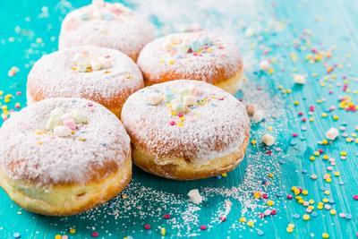 Carnival powdered sugar raised donuts - German Berliner donuts Carnival powdered sugar raised donuts - German Berliner d-stock-photo