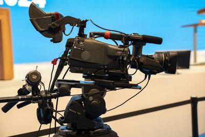 Augsburg, Swabia, Bavaria, Germany - October 12, 2024: TV camera of the public broadcaster filming at a party conference-stock-foto