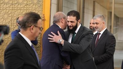 Commander-in-Chief of the New Syrian Administration, Ahmad al-Shara', meets with Jordanian Minister of Foreign Affairs-stock-photo