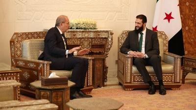 Commander-in-Chief of the New Syrian Administration, Ahmad al-Shara', meets with Jordanian Minister of Foreign Affairs-stock-photo