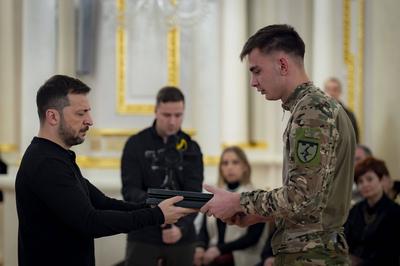 Ukrainian President Volodymyr Zelensky, awarded the soldiers with the highest state awards and handed-stock-photo