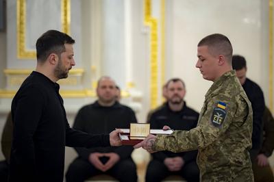 Ukrainian President Volodymyr Zelensky, awarded the soldiers with the highest state awards and handed-stock-photo