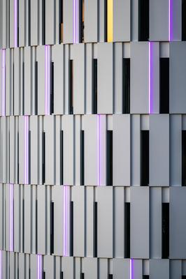 Contemporary abstract patterns of a high rise building by night in Tirana, Albania, DEC 7, 2024-stock-photo