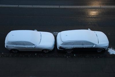 cars windows are covered with frost and snow fall from yesterday in kastrup copenhagen denmark.-stock-photo