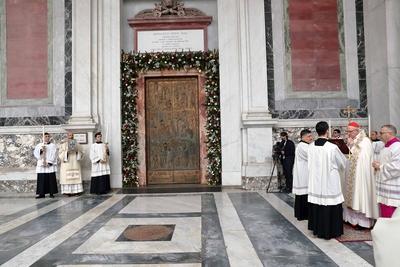 ITALY -  CARDINAL JAMES MICHAEL HARVEY OPENS THE HOLY DOOR OF THE BAILICA OF SAINT PAUL OUTSIDE THE WALLS , FOR THE JUBILEE, IN ROME  - 2025/1/5-stock-photo