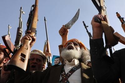 Houthi supporters protest against the US and Israel in Sana'a --stock-photo
