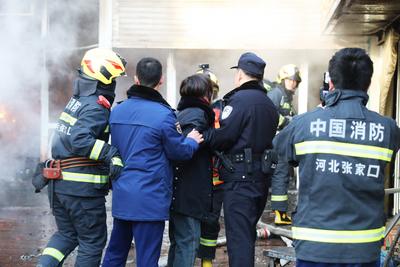 ZHANGJIAKOU, CHINA - JANUARY 04: Firefighters work at the site of a fire broke out at a marketplace on January 4, 2025 i-stock-foto