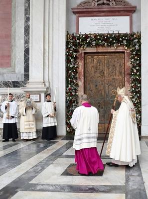 ITALY -  CARDINAL JAMES MICHAEL HARVEY OPENS THE HOLY DOOR OF THE BAILICA OF SAINT PAUL OUTSIDE THE WALLS , FOR THE JUBILEE, IN ROME  - 2025/1/5-stock-photo