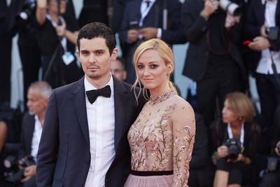 Actress Olivia Hamilton and director Damien Chazelle walks the red carpet ahead of the Opening Ceremony and the First Ma-stock-foto
