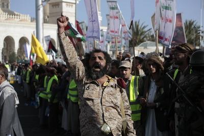 Houthi supporters protest against the US and Israel in Sana'a --stock-photo