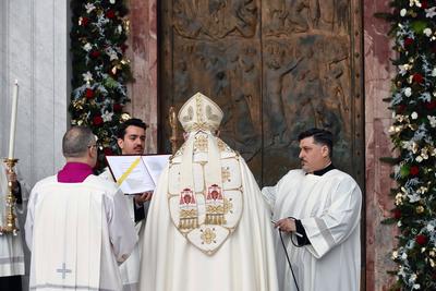 ITALY -  CARDINAL JAMES MICHAEL HARVEY OPENS THE HOLY DOOR OF THE BAILICA OF SAINT PAUL OUTSIDE THE WALLS , FOR THE JUBILEE, IN ROME  - 2025/1/5-stock-photo
