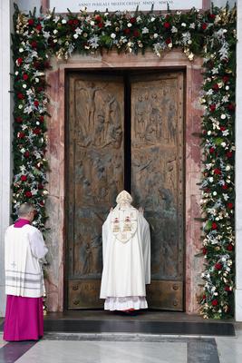 ITALY -  CARDINAL JAMES MICHAEL HARVEY OPENS THE HOLY DOOR OF THE BAILICA OF SAINT PAUL OUTSIDE THE WALLS , FOR THE JUBILEE, IN ROME  - 2025/1/5-stock-photo