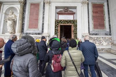 ITALY -  CARDINAL JAMES MICHAEL HARVEY OPENS THE HOLY DOOR OF THE BAILICA OF SAINT PAUL OUTSIDE THE WALLS , FOR THE JUBILEE, IN ROME  - 2025/1/5-stock-photo