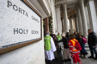 ITALY -  CARDINAL JAMES MICHAEL HARVEY OPENS THE HOLY DOOR OF THE BAILICA OF SAINT PAUL OUTSIDE THE WALLS , FOR THE JUBILEE, IN ROME  - 2025/1/5-stock-photo