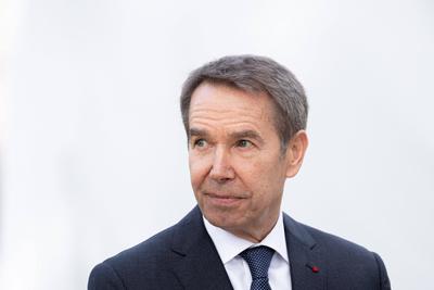 US artist Jeff Koons looks on during the unveiling of his sculpture Bouquet of Tulips, near The Petit Palais Museum in-stock-photo