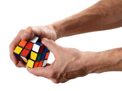 geschicklichkeit,denkspiel,zauberw?rfel *** skill,puzzle,magic cube,experienced,skills,puzzles,magic cubes,magic wand,ru-stock-photo