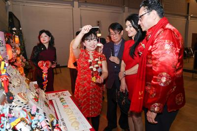 TORONTO, CANADA - JANUARY 10: Canadian federal congressman Majid Jowhari (R) and his wife (R2) view dough models during-stock-foto