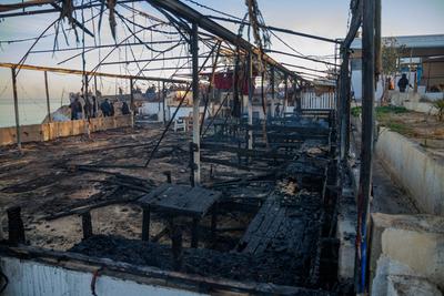 Israeli bombing targets lorence cafeteria in deir al-balah, central gaza strip, at dawn on the 466th day of the war.-stock-photo