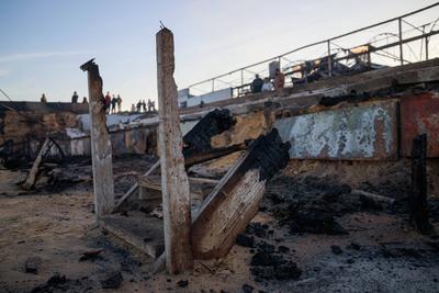 Israeli bombing targets lorence cafeteria in deir al-balah, central gaza strip, at dawn on the 466th day of the war.-stock-photo