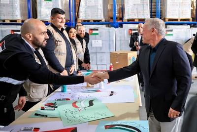 King Abdullah II of Jordan visits the warehouses of the Jordanian Hashemite Charity Organization and witnesses the organization's-stock-photo
