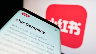 Smartphone with website of Chinese social media company Xiaohongshu on screen. Stuttgart, Germany - 07-30-2022: Smartpho-stock-photo