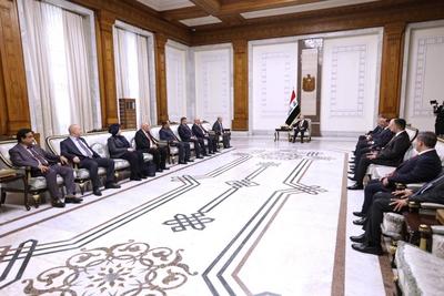 Iraqi President Abdul Latif Jamal Rashid, receives the Chairman and members of the Board of Commissioners of the Independent High Electoral Commission-stock-foto